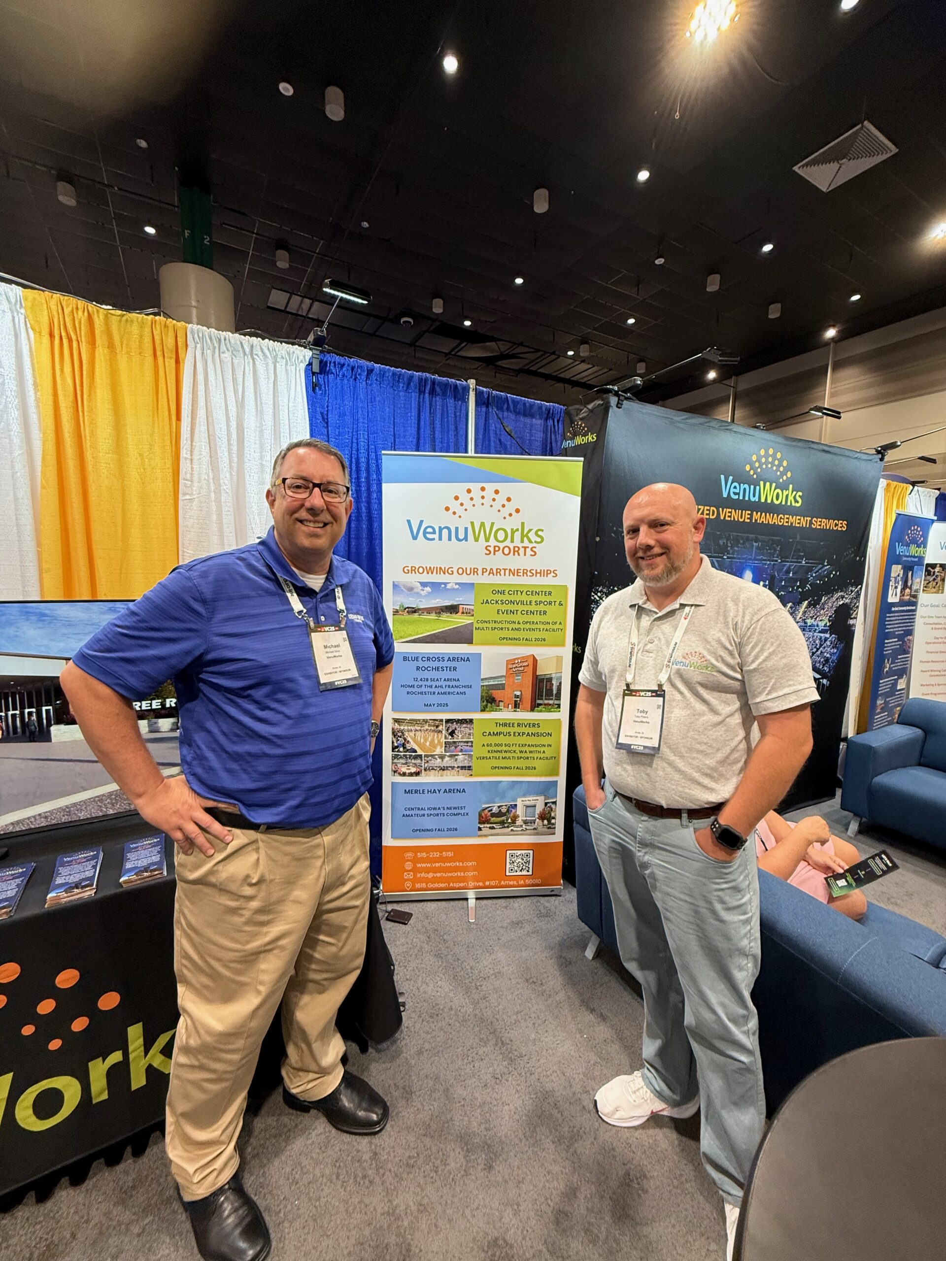 Mike Silva, COO, and Toby Peters, Chief Development Officer, show off VenuWorks Sports at VenueConnect in New Orleans.