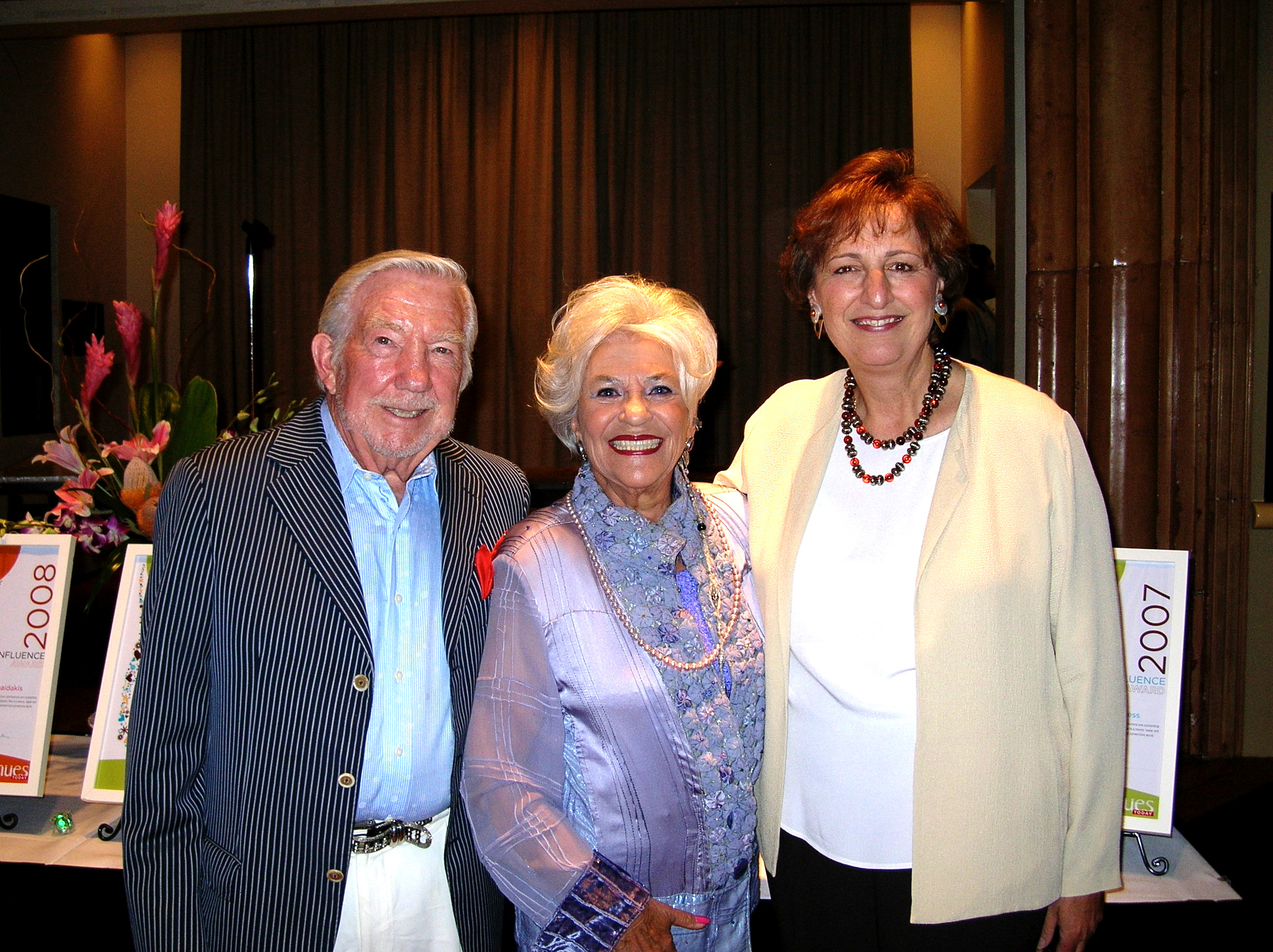 Claire Rothman, center, with husband Edwin Hill and Peggy Daidakis in 2008.