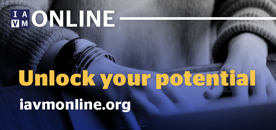 Person typing on keyboard with blue gradient overlay. IAVM Online logo. "Unlock your potential" iavmonline.org